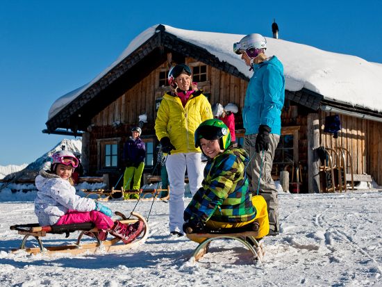 Family in front of the Hochwurzenalm
