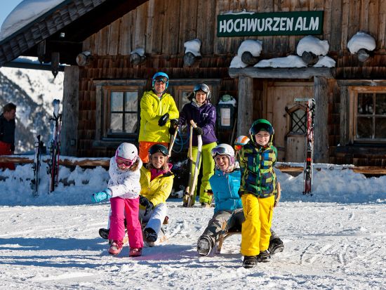 The kids can not wait to go sledding after a break at the Hochwurzenalm