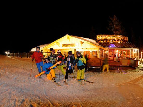 Night skier in front of the Seiterhütte